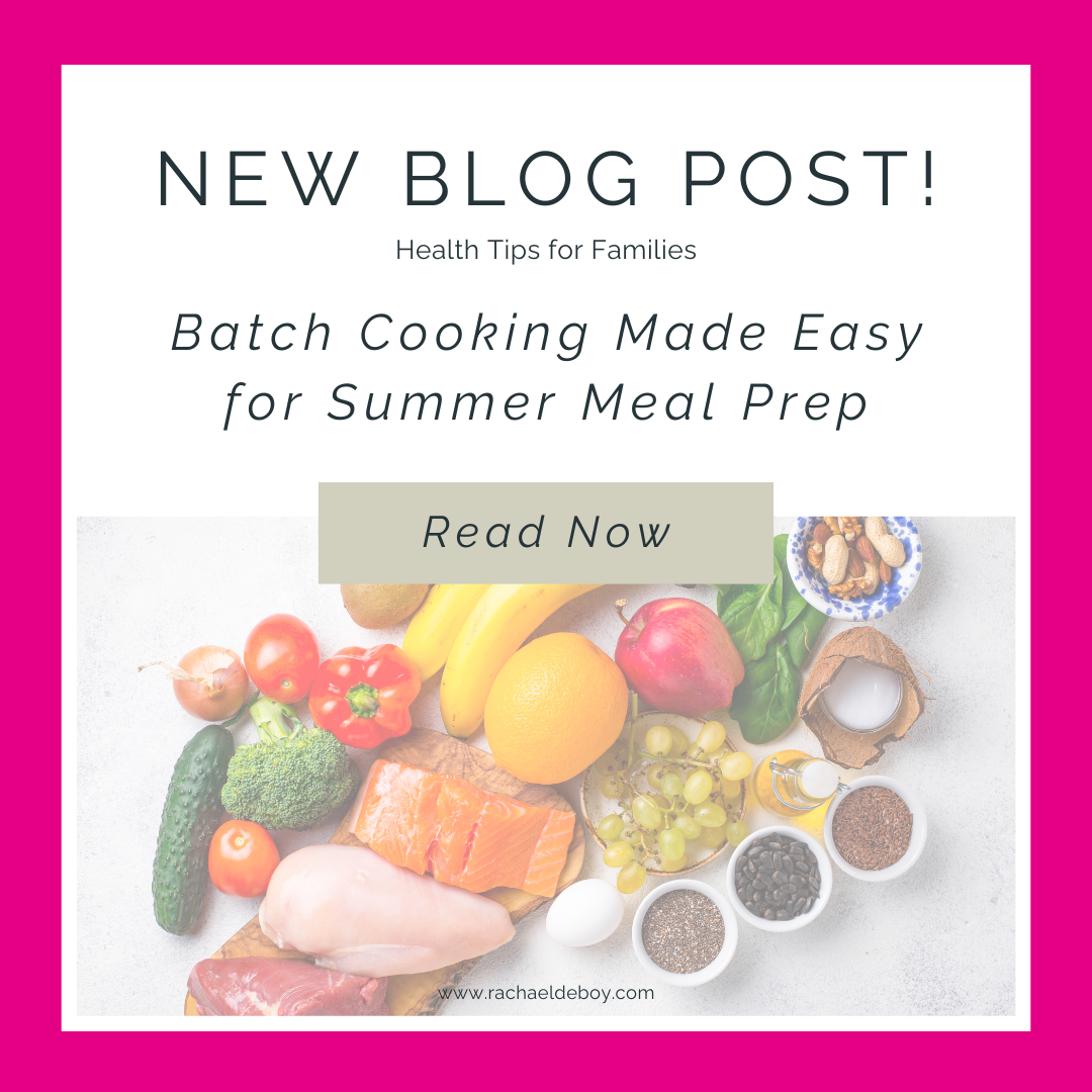Flat lay of healthy ingredients for batch cooking including salmon, chicken, vegetables, fruit, nuts, and grains.