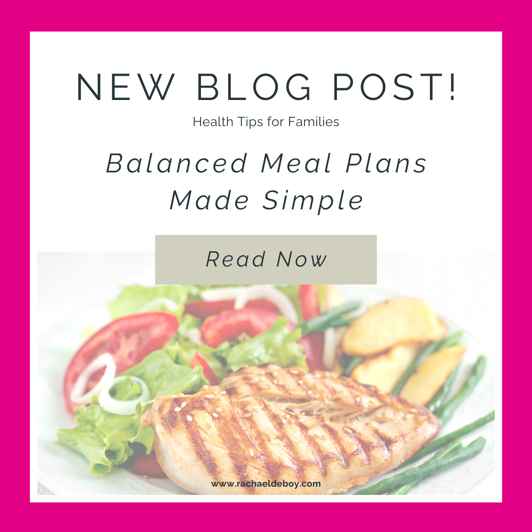 Grilled chicken meal with vegetables and potatoes on a white plate representing a balanced, whole-food meal plan.